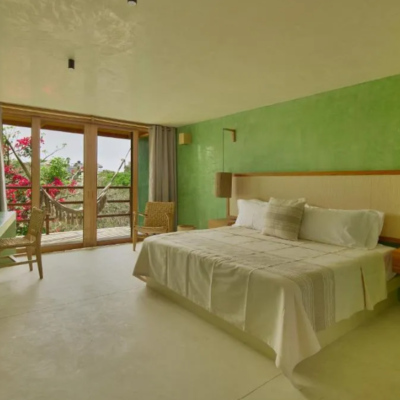 Punta Nayaá | Suite con cama grande y balcón