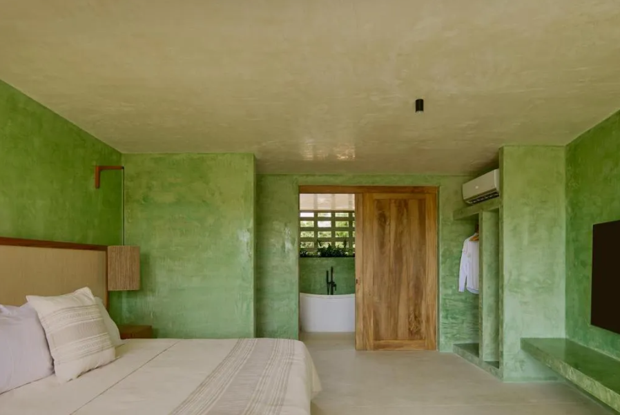 Punta Nayaá | Suite con cama grande y balcón